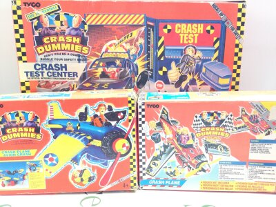 A Collection Of Boxed Tyco Crash Test Dummies Sets.