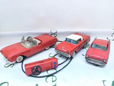 A Vintage Japanese Tinplate Battery Operated Yonezawa Cragstan Ford Thunderbird Car. A Battery Bump And Go And A Friction powered Car. From A Lifetime Private Collection To Be Sold.