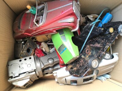 A Box Containing Tinplate Toy Spare Parts Etc.  Ideal For Spares And Repairs. No Reserve, From A Lifetime Private Collection.