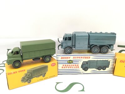 A Boxed Dinky Pressure Refueller #642, A 3-Ton Army Wagon #621 And A 7.2 Howitzer #693