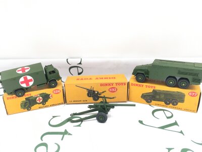 A Boxed Dinky Ambulance #626, A Amoured Command Vehicle #677 And A 5.5 Medium Gun #692.