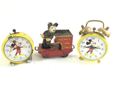 A Wells Tinplate Part Of A Mickey Mouse Train Set (Tender) with 2 Vintage Pinney Walker Micky Mouse Clocks (Both Need Attention).