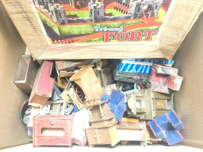 A Box Containing Dolls House Furniture And A Boxed Tri-Ang Fort.
