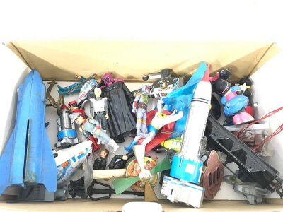 A Box Containing Vintage Star Wars, Captain Scarlet And Other Toys And Figures.
