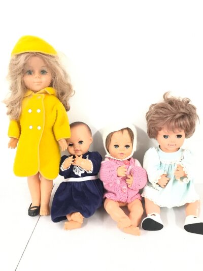 A Collection Of 4 60s And 70s Dolls. British Made Including Doll In Yellow 1960s Design Coat. (2).