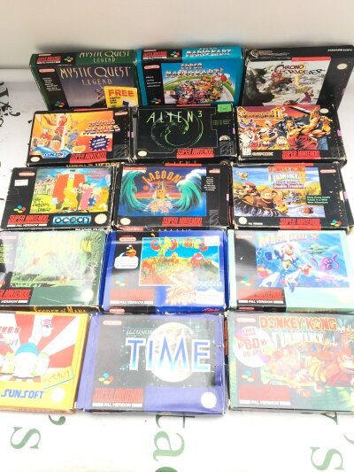 A Collection Of Boxed Super Nintendo Games All With Manuals. 15 in Total.