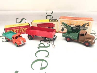 A Boxed French Dinky Toys Dodge Tipper #414 (Box Is Worn). A Trailer #428 And A Breakdown Lorry #25C