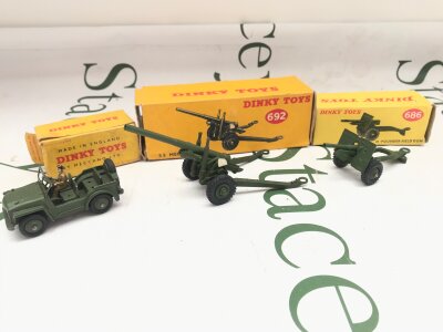 A Boxed Dinky Austin Camp #674. A 5.5 Medium Gun And A 25-Pounder Field Gun #686. Boxes In Various States.