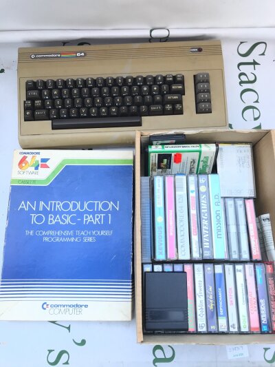 A Commodore 64 With Games and Accessories.