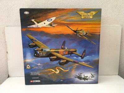 A boxed Corgi Aviation Archive diecast model set of 3 aircraft featuring the Battle of Britain Memorial flight with a Avo Lancaster MICKEY THE MOOCHER,  a Spitfire MkIIa and a Hawker Hurricane.  AA32602 limited edition 1:72 scale.  No reserve
