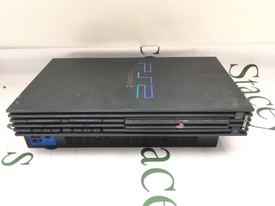 A Sony PlayStation 2 With Games And Demo Discs. No Reserve.