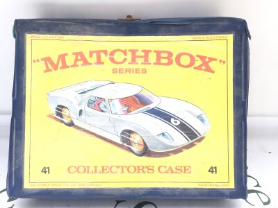 A Match Box Collectors Case Containing Various Diecast Cars Including A Husky Monkee Mobile