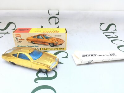 A Boxed Dinky Toys Gold U.F.O. Ed Strikers Car #352