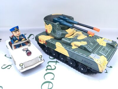 A Japanese Nomura Battery Operated Mystery Police Car, And A Yonezawa M-75 Tank. No Reserve.