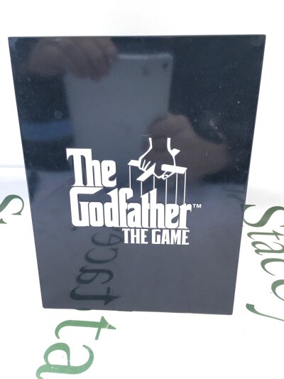 A PlayStation 2 Game Of The Godfather In Limited Edition Tin.