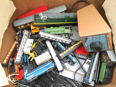 A Box Containing 00 And N Gauge Locos, Coaches And Track. No Reserve.