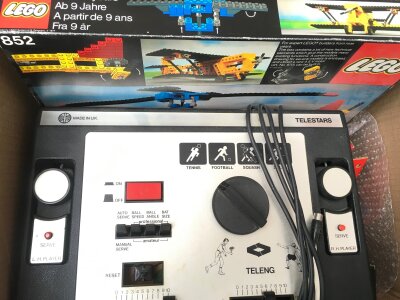 A Box Containing Vintage Lego, A Telestars Video Console And Some TCR Track. No Reserve.