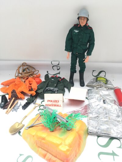 A Vintage Action Man With A Collection Of Various Uniforms And Accessories.2 Other Action Men Which Are Ideal For Spares/Repairs.