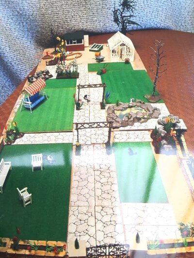 A Box Containing Britains Miniature Garden. No Reserve.