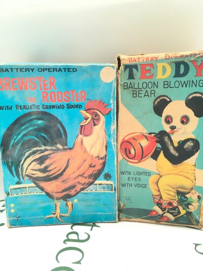 A Boxed Alps Battery Operated Balloon Blowing Bear And A Yonezawa Toys Brewster The Rooster.(2).