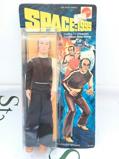 A Mattel Carded Space 1999 Professor Bergman. Blister Has Damage.