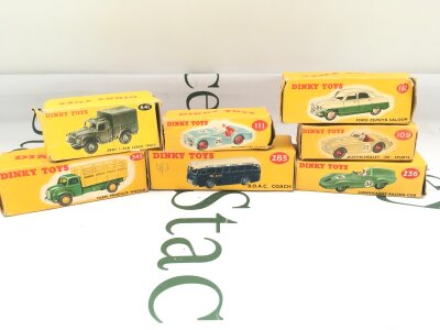 7 Boxed Dinky Toys Including Army 1-Ton Cargo Truck, A Triumph Tr2 Sports, A Ford Zephyr Saloon, A Farm Produce Wagon, A B.O.A.C. Coach, A Austin-Healey 100 Sports And A Connaught Racing Car.