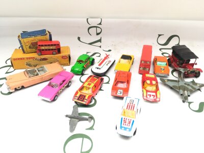 A Boxed Dinky Cadillac Tourer, A Boxed Matchbox Routemaster And A Collection Of Loose Matchbox Cars in Very Good Condition. No Reserve.