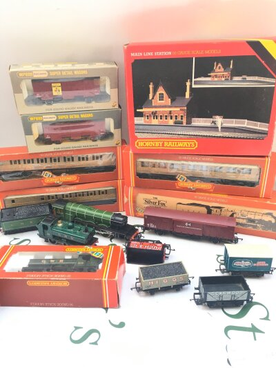 A Collection Of Boxed And Loose Hornby 00 Gauge Locomotives, coaches, Wagons, And Buildings.