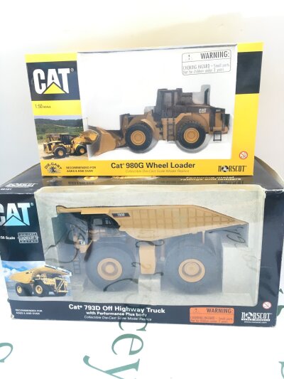 A Boxed Norscot 1/50 Scale CAT. Highway Truck And A CAT Wheel Loader. (2).