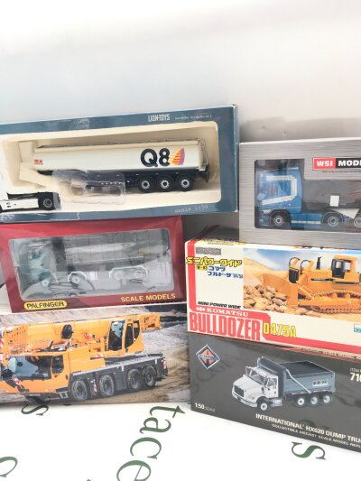 A Collection Of Boxed Diecast Including WSI Models. Lion-Toys, palfinger Etc.