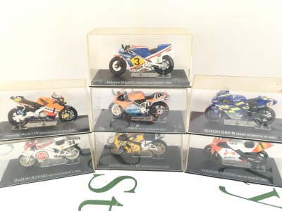 A Collection Of 27 Boxed Deagostini Motorcycles.