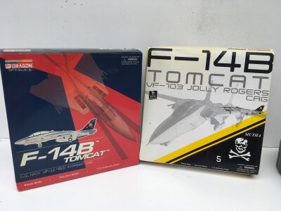 2x Boxed model aircraft by Dragon in the warbirds series featuring F14 Tomcats  RED RIPPERS and JOLLY ROGERS.  Diecast 1:72 scale.  No reserve. (2)