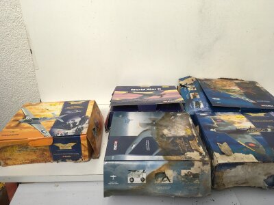 A collection of  5 Corgi Aviation Archive diecast models.  All of these have water damaged boxes to varying degrees but the models appear to be in their plastic packaging.  1:72 scale. No reserve