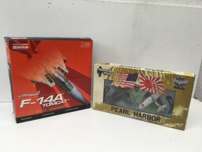 2 boxed diecast model warplanes featuring a Dragon Wings F14A Tomcat 1:72 scale and Italeri Pearl Harbour set1:100 scale.
No reserve (2)