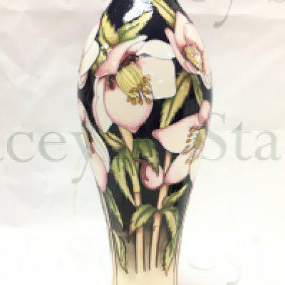A Moorcroft Hellebores Red Dot (seconds) vase , 31cm tall. This lot cannot be posted