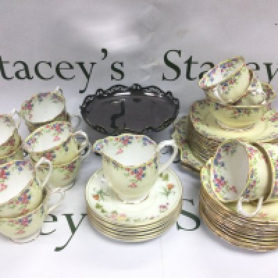 A collection of Royal Albert teaware in Maytime pattern plus some Wedgwood saucers and a silver plated tazza. Shipping category D.