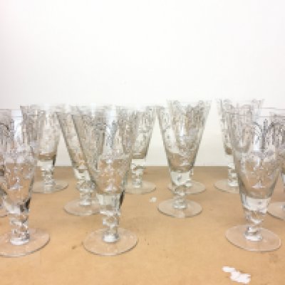 12 drinking glasses with gilt decoration . This lot cannot be posted