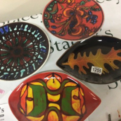 A collection of mid 20th century Poole pottery designer dishes one cracked. (4) No Reserve.