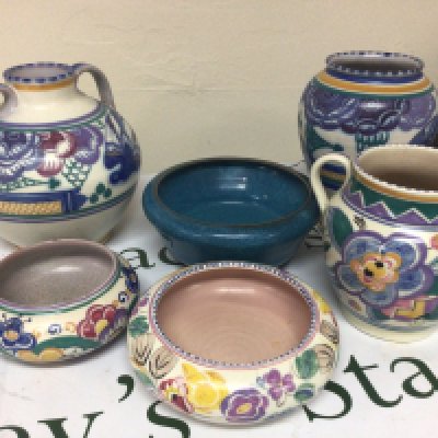 A collection of Poole Pottery Including early Carter Stapler Adam Poole (6) some damage.