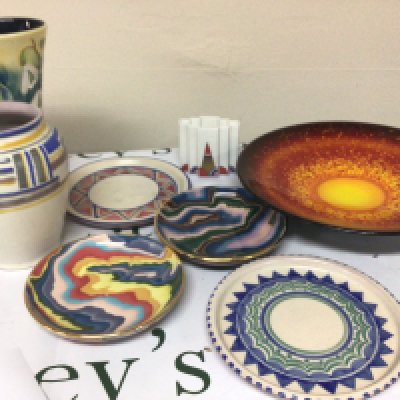 A limited edition Poole dish Sun & Moon 45/1000 signed to the reverse An Art Deco design Poole cigarette holder Jersey Bouchet Agate ware limited edition and other ceramics.