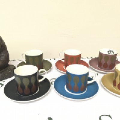 A Modern design Wedgwood Coffee service Susie Cooper Design multi coloured set and simulated bronze sculpture.