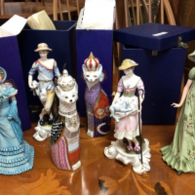 Four Royal Crown Derby boxed figures including Royal Cats and a Shepherd and Sheperdess, together with two boxed Limited Edition Capo-Di- Monte boxed figures with stands,