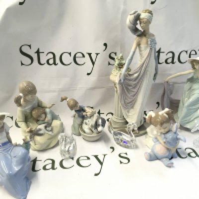 Lladro, Nao and Swarovski porcelain and crystal glass figures . This lot cannot be posted