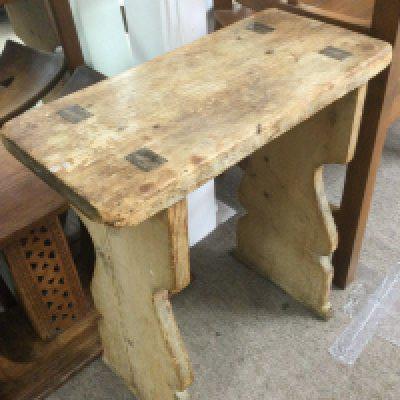 A rustic pine stool, approx height 55cm. Shipping category D.