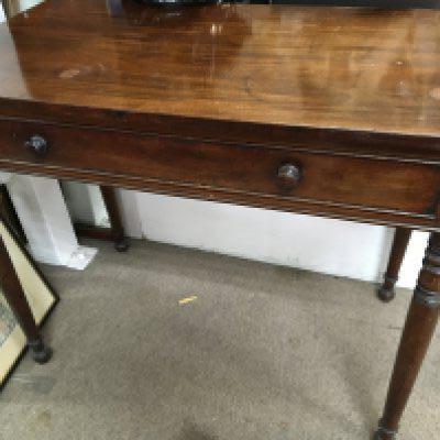 An Early Victorian Mahogany side table the rectangular top above a single drawer on turned legs. NO RESERVE