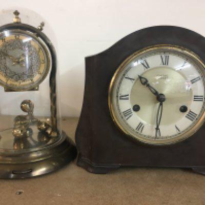 A anniversary clock and a smiths mantal clock .