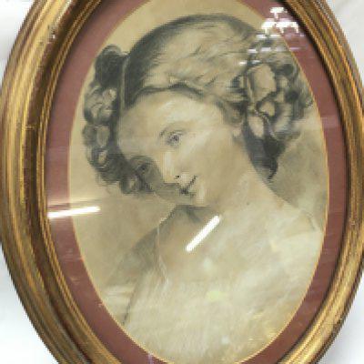 An early 20th century framed chalk and charcoal sketch of a woman . 47cm tall 37cm wide. This lot cannot be posted