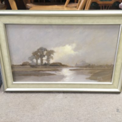 A painting of a countryside view signed Vic Ellis. Approx measurements 75x50cm.