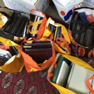 Seven bags of first day covers and and royal mail special stamp albums