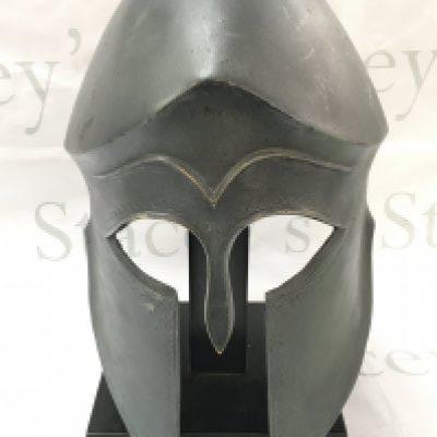 A bronze replica Greek Spartan helmet . 26cm tall. Postage catC